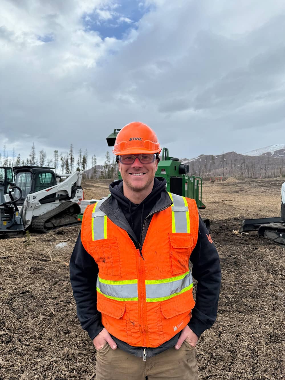 Bear Claw Fire Mitigation crew member ready to provide free estimates to Colorado homeowners.