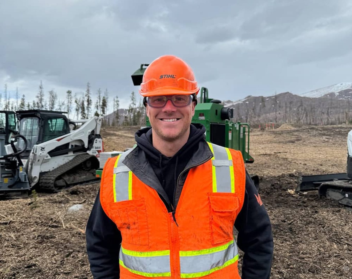 Bear Claw Fire Mitigation crew member ready to provide free estimates to Colorado homeowners.